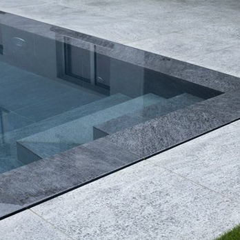 Designtech Builders - Black modern coping - General Contractors Near Me