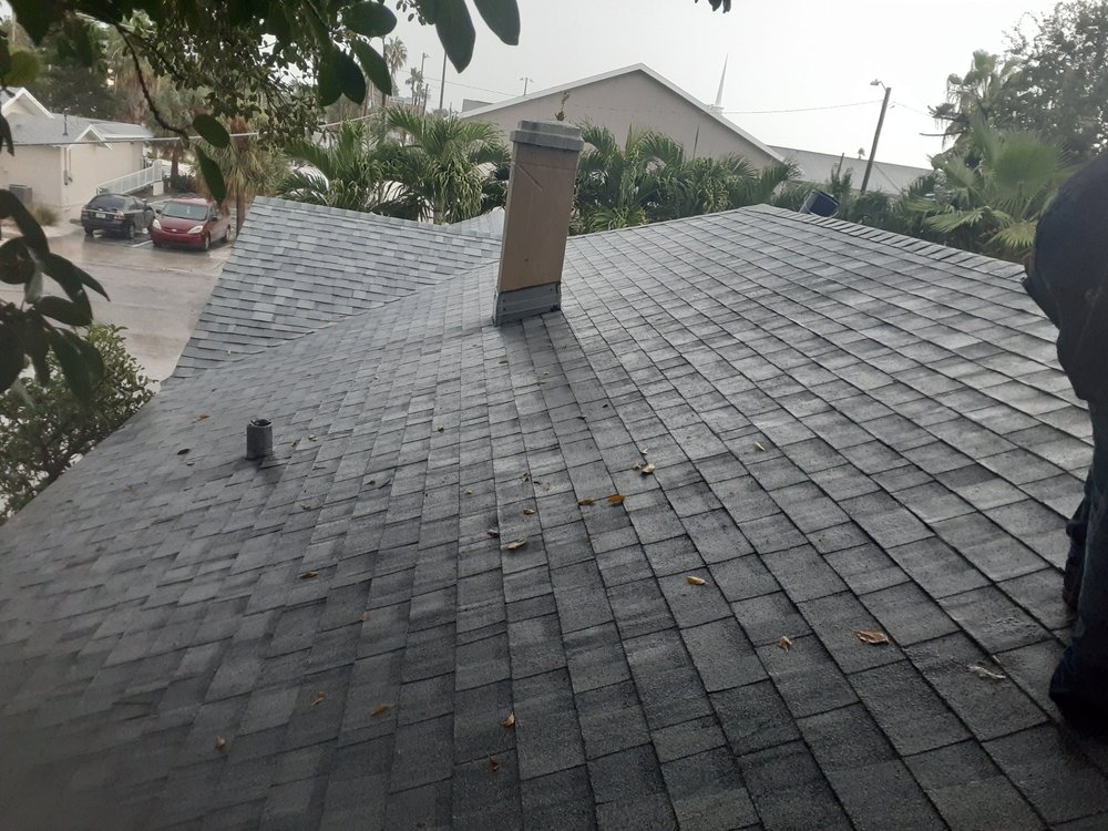 Slide of CB Roofing Construction