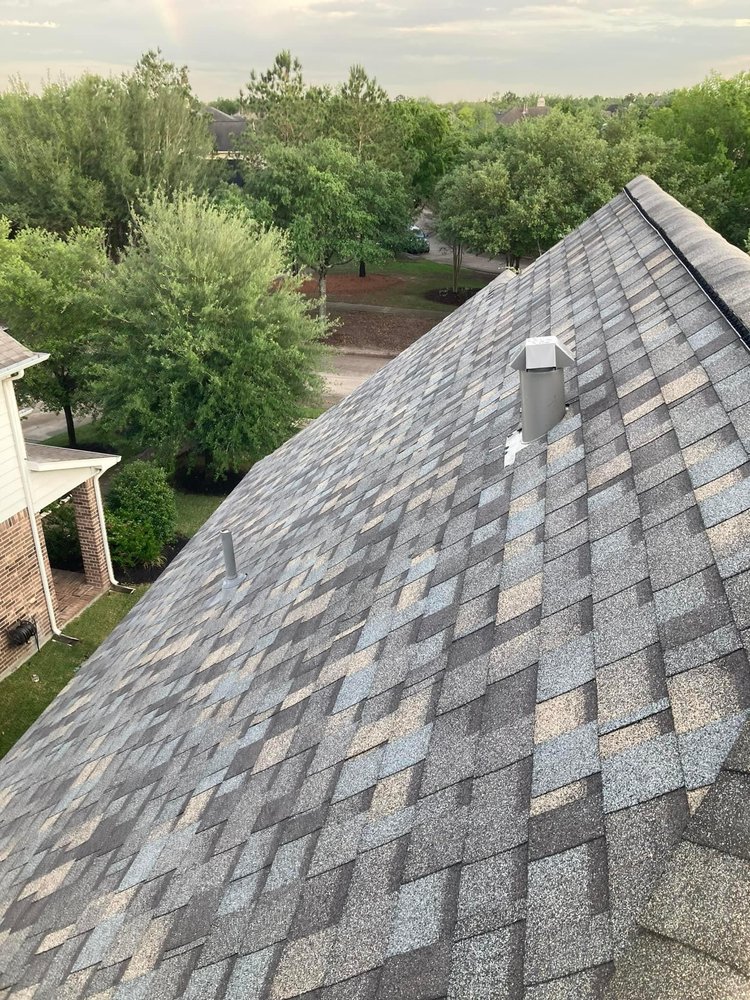 Slide of Compass Roofing