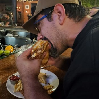 D4 Irish Pub & Cafe - Pulled Pork Sandwich, big loaded sandwich- juicy,  flavorful, and messy as pulled pork should be. - Irish Pub Near Me - Chicago, Illinois