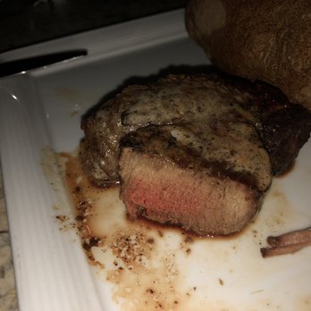 Brazos Bar & Bistro - Well done steak and cold baked potato. - American Near Me - Waco, Texas