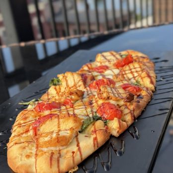 The Rooftop Lounge Oswego - Chicken Flatbread - New American Near Me - Oswego, New York The Rooftop Lounge Oswego - Chicken Flatbread - New American Near Me - Oswego, New York
