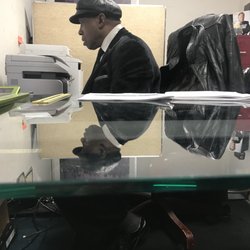 The Bankruptcy Clinic - Here Mr. Albert sits and painstakingly finger pecks on his computer as I'm pressed for time & notice his Trump book-Really?