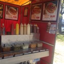 Happy Dog - Ghost pepper sauce and many toppings not seen at other hot dog stands.