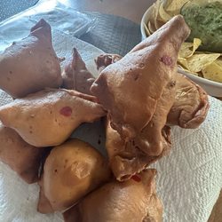 Baba Sweets & Restaurant - Samosas were drenched in oil and seemed burnt .