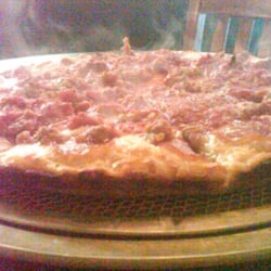 Tomaso's Pizza World Headquarters - A pepperoni and sausage Detroit pie straight from the oven to our table.