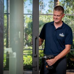 Key Breeze Locksmith - Repairing a sliding-glass-door lock to keep coastal homes safe and breezy year-round.