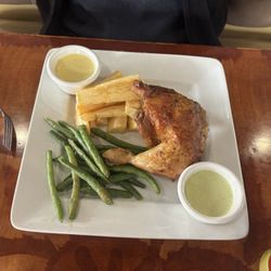 Las Caverns - 1/4 chicken with 2 sides (green beans and yuca). Plus two sauces (unknown) but really good. One was spicy and one was mild.