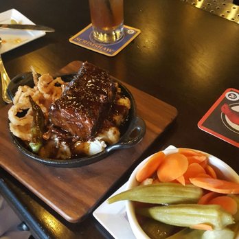 Bosscat Kitchen & Libations - Pickles. Good counterpoint to richness of short rib - New American Near Me - Houston, Texas