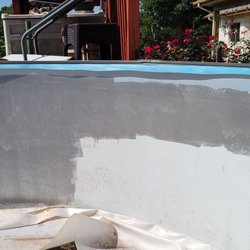 Whitetail Pool Service - Cleaning up the sides of the above ground pool before installing the new liner.