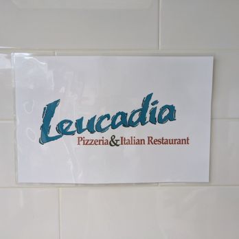 Leucadia Pizza Kitchen - a sign on the wall - Pizza Near Me - Point Loma, California