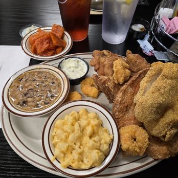Mom’s House - Surf and Cluckers w/catfish, chicken thigh,  breast, 5 shrimp, sweet potatoes, Mac&Cheese, black eyed peas. The Cornbread was camera shy.. - Waffles Near Me - Bakersfield, California