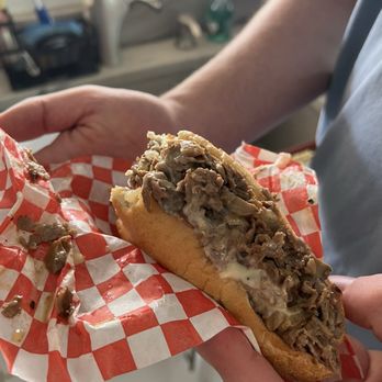 Eddies Philly - Cheesesteak with mushroom and onion, missing a couple of bites. - Sandwiches Near Me - Chandler, Arizona