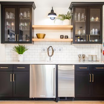 Elite Kitchen & Bath - a kitchen with black cabinets and a stainless steel dishwasher - Interior Design Near Me - Santa Barbara, California Elite Kitchen & Bath - a kitchen with black cabinets and a stainless steel dishwasher - Interior Design Near Me - Santa Barbara, California