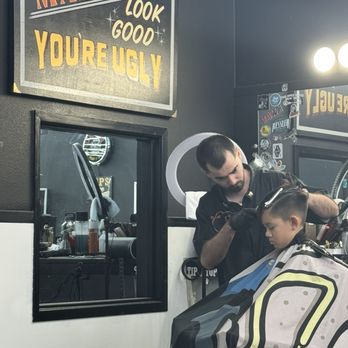 The Proper Barbershop - Sam and my youngest joked about that sign after his haircut - Barbers Near Me - Orange, California The Proper Barbershop - Sam and my youngest joked about that sign after his haircut - Barbers Near Me - Orange, California