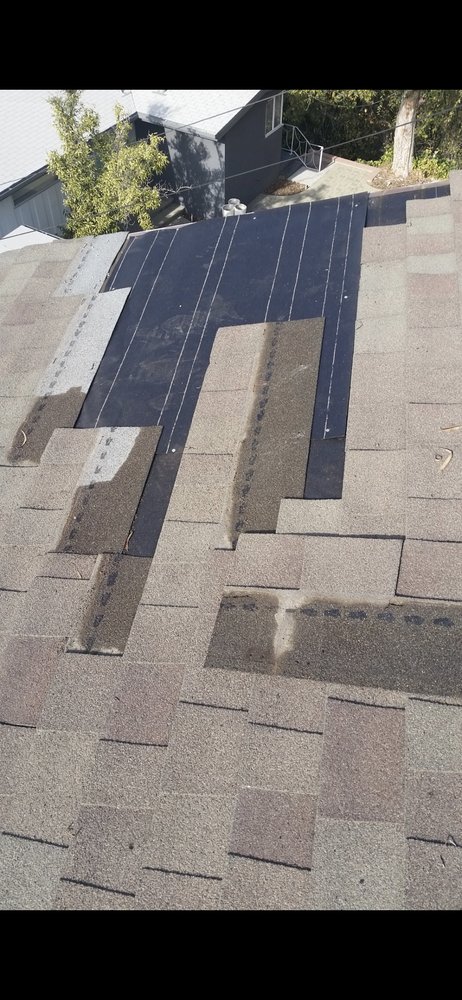 Slide of Ace Roofing Company