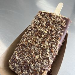 La Michoacana Ice Cream Shop - Pistachio dipped in milk chocolate with pecans topping
