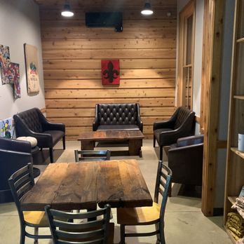 Coffee on the Red - a coffee shop with chairs and a table - Coffee & Tea Near Me - Bossier City, Louisiana Coffee on the Red - a coffee shop with chairs and a table - Coffee & Tea Near Me - Bossier City, Louisiana
