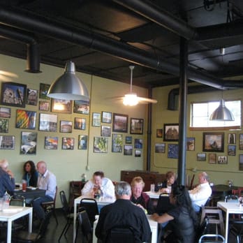 Ricos World Kitchen - The dining area...loved the pics on the wall! - New American Near Me - Buford, Georgia Ricos World Kitchen - The dining area...loved the pics on the wall! - New American Near Me - Buford, Georgia