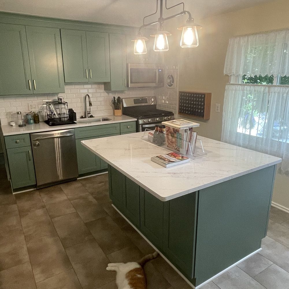 Aaction Home Repairs - Renovated entire kitchen  with new cabinets and floor. Lou lou loves the new floor! - General Contractors Near Me - Millersville, Maryland