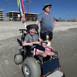 Crabby's Beach Wheels, Inc - The Coconut beach wheelchair woad great for Andy!!