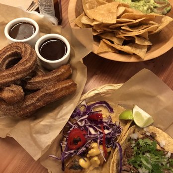 Doña - Fish and barbacoa taco, chips and guacamole and churros. - Mexican Near Me - Oakland, California Doña - Fish and barbacoa taco, chips and guacamole and churros. - Mexican Near Me - Oakland, California