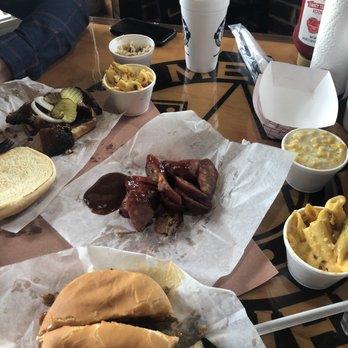 Meat U Anywhere BBQ - Brisket sandwich, jalapeño cheddar sausage, and pulled pork sandwich.  The sides are creamed corn, bacon Mac and cheese, and cole slaw. - Barbeque Near Me - Grapevine, Texas