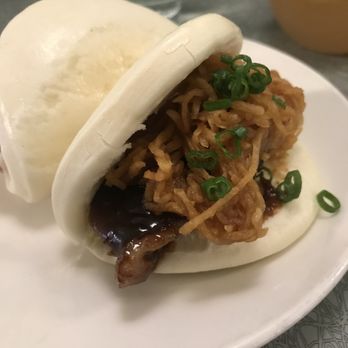 Ivan Ramen - STEAMED PORK BUNS soy-plum glaze, pickled daikon - Ramen Near Me - New York, New York Ivan Ramen - STEAMED PORK BUNS soy-plum glaze, pickled daikon - Ramen Near Me - New York, New York