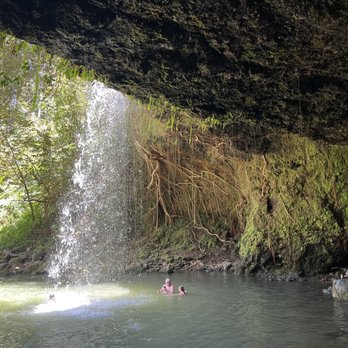 Hike Maui - In small cave seeing the backside of the waterfall. - Tours Near Me - Kahului, Hawaii Hike Maui - In small cave seeing the backside of the waterfall. - Tours Near Me - Kahului, Hawaii
