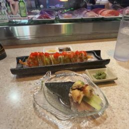 Luna roll, pickled wasabi, soft shell crab hand roll Luna roll, pickled wasabi, soft shell crab hand roll