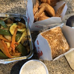 Shrimp curry with white rice, fried chicken wings, and shrimp fried rice