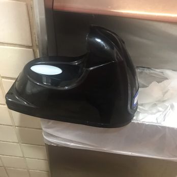 Torchy's Tacos - Soap Dispenser resting on the Trash Bin - Tex-Mex Near Me - Austin, Texas