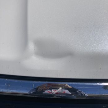 Dings n Dent - Before, tree branch - Mobile Dent Repair Near Me