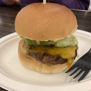 Buckhorn Grill - SF Metreon - Bacon Cheddar Burger with a small nibble of bacon - Barbeque Near Me - San Francisco, California Buckhorn Grill - SF Metreon - Bacon Cheddar Burger with a small nibble of bacon - Barbeque Near Me - San Francisco, California