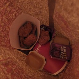 a bowl of chicken nuggies and a cup of coffee a bowl of chicken nuggies and a cup of coffee