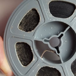 Vintage Images - Mold covered 8mm film reel.