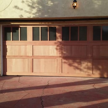 Sam's Garage Doors - light wood with square windows - Garage Door Services Near Me - Los Alamitos, California Sam's Garage Doors - light wood with square windows - Garage Door Services Near Me - Los Alamitos, California
