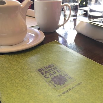 Blind Faith Cafe - Still life with tea and menu. - Vegetarian Near Me - Evanston, Illinois Blind Faith Cafe - Still life with tea and menu. - Vegetarian Near Me - Evanston, Illinois