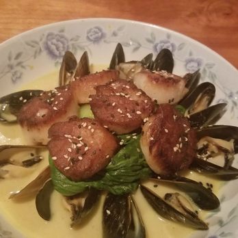 Catch Restaurant - Mussels and scallops in yellow curry butter. - Seafood Near Me - Wilmington, North Carolina Catch Restaurant - Mussels and scallops in yellow curry butter. - Seafood Near Me - Wilmington, North Carolina