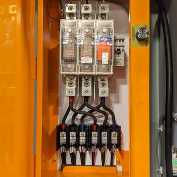 Elworthy Electrical Services - electrical equipment in orange cabinet - General Contractors Near Me - Burnaby, British Columbia Elworthy Electrical Services - electrical equipment in orange cabinet - General Contractors Near Me - Burnaby, British Columbia