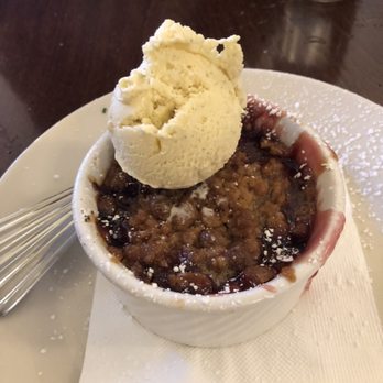 Common Grill - Cherry cobbler with vanilla bean ice cream - New American Near Me - Chelsea, Michigan