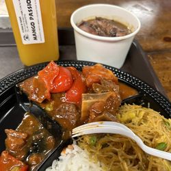 Kusina Ni Inang - Platter with SQUID ADOBO and Goat Kaldereta, rice noodles and steamed rice.