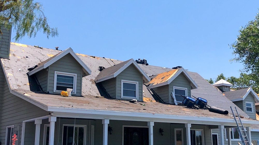 Slide of Sandoval Roofing