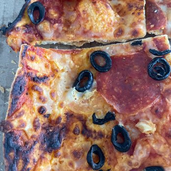 Domino's Pizza - a slice of pizza with black olives - Pizza Near Me - Rathdrum, Idaho Domino's Pizza - a slice of pizza with black olives - Pizza Near Me - Rathdrum, Idaho