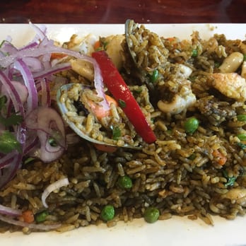 Inka Mama's - Delish seafood paella with tilapia mussels and calamari - Peruvian Near Me - Foothill Ranch, California Inka Mama's - Delish seafood paella with tilapia mussels and calamari - Peruvian Near Me - Foothill Ranch, California
