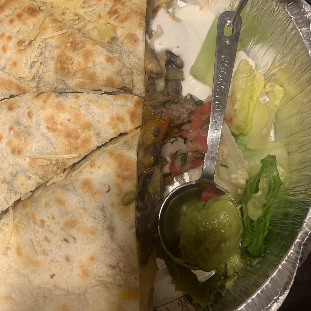 Cafe Sabor - Tablespoon is not full but holds the guacamole I was served. - Mexican Near Me - Logan, Utah Cafe Sabor - Tablespoon is not full but holds the guacamole I was served. - Mexican Near Me - Logan, Utah