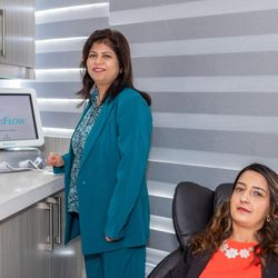 Divine Eye Care - Dr. Mridu Chaudhry showing eye care materials