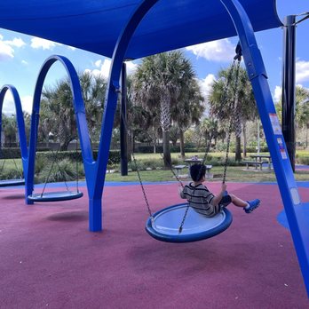 Veterans Park - Saucer swings - Parks Near Me - Sunrise, Florida Veterans Park - Saucer swings - Parks Near Me - Sunrise, Florida