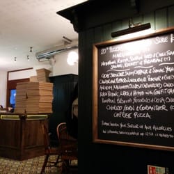 Homeslice Pizza - Menu and interior.