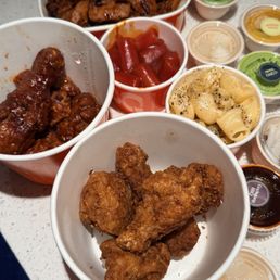 2 5-piece buckets, mac, tteokbokki, gochujang grilled chicken, sauces